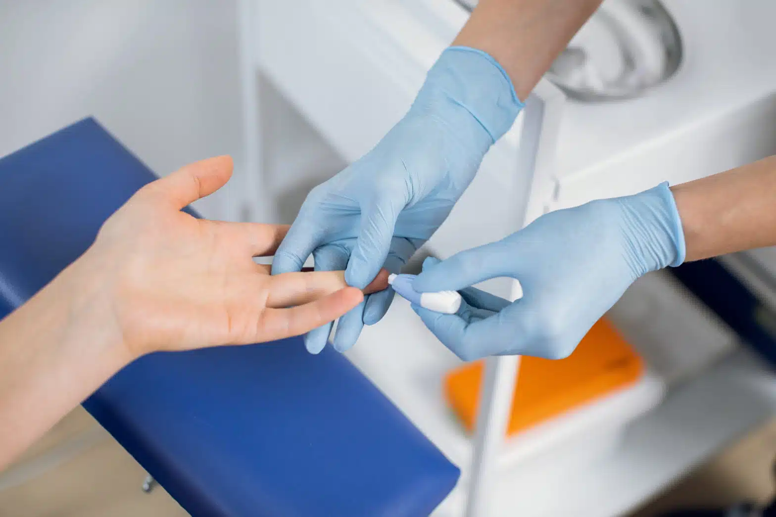 Image of medical profession performing HIV test